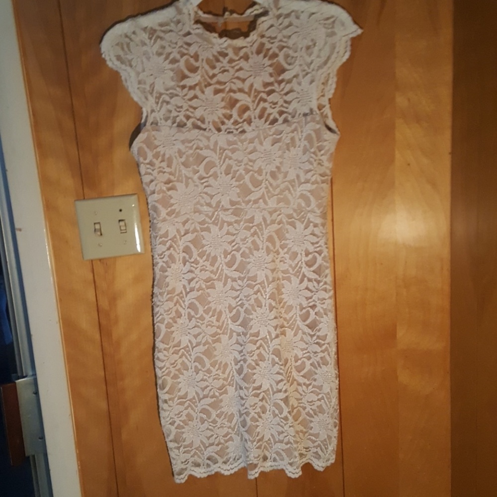White dress with nude under garment